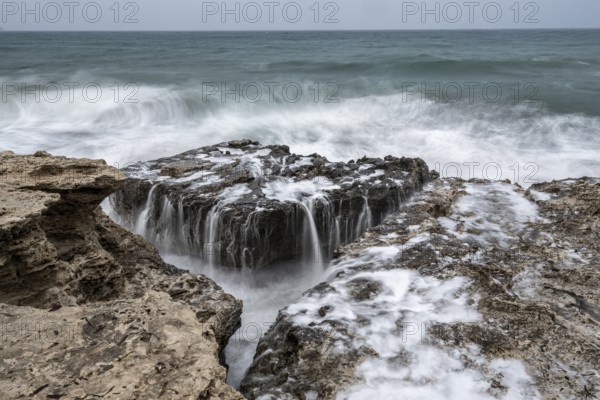 Waves on rocky coast, Playa Los Escullos, Cabo de Gata, Los Escullos, Playa del Arco, El Arco beach, Cabo de Gata-Nijar Natural Park, Almeria, Andalusia, Spain, Europe