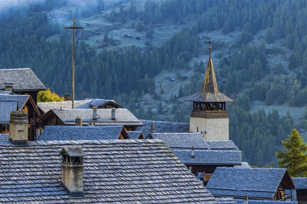 Roofs covered with hoarfrost, fog rising, Grimentz, Val d'Anniviers, Valais Alps, Canton Valais, Switzerland, Europe