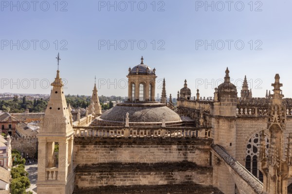 Gothic cathedral with towers and rich architecture in an urban setting, Seville