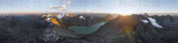 Evening mood, mountain panorama, aerial view, 4000 metre peak with glacier, mountain pass and mountain lake Ala-Kul Lake, Tien Shan, Kyrgyzstan, Asia