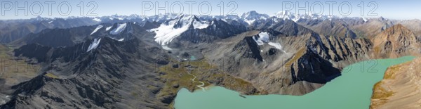 Mountain panorama, aerial view, 4000 metre peak with glacier, mountain pass and mountain lake Ala-Kul Lake, Tien Shan, Kyrgyzstan, Asia