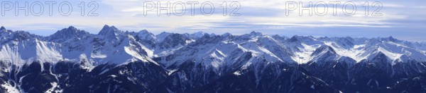 Alpine panorama with snow-covered mountain peaks in winter. Taken in the ski resort of Serfaus Fiss Ladis (Tyrol, Austria)