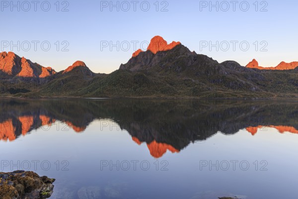 Mountains reflected in fjord, morning light, sunny, autumn, Annfjord, Vesteralen, Norway, Europe