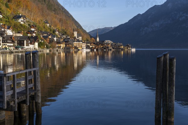 View of Hallstatt and Lake Hallstatt. In the morning in autumn. Good weather, blue sky. Reflection. Hallstatt, Gmunden, Salzkammergut, Upper Austria, Austria, Europe