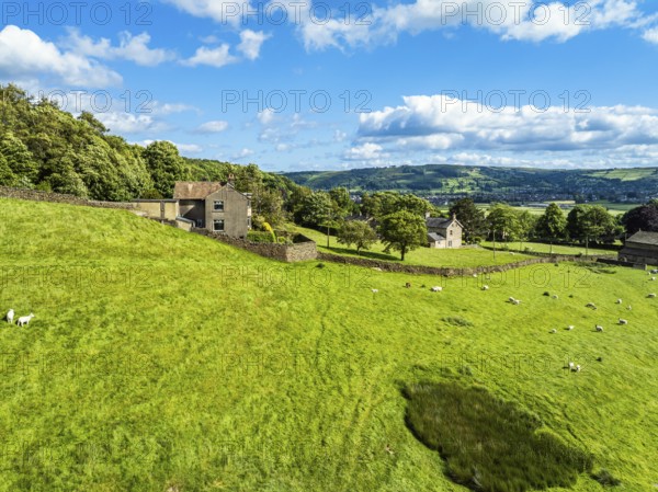 Farms and Fields over Cononley and River Aire from a drone, Keighley, North Yorkshire, England, United Kingdom, Europe