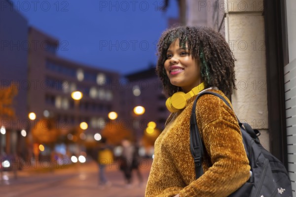 Portrait of black ethnic girl in the early morning going to the university on the way back to school