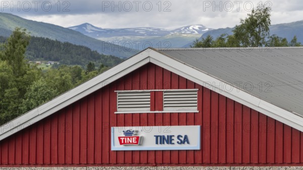 Red building of the Tine dairy, largest dairy in Norway, Dovre, Fylke Innlandet, Upper Gudbrandsdalen, Norway, Europe