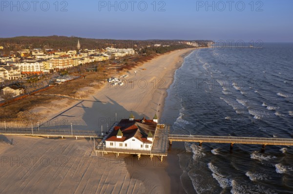 Aerial view over restaurant on Ahlbeck Pier/ Seebrücke Ahlbeck in the Baltic Sea on Usedom island, Mecklenburg-Vorpommern, oldest pier in Germany