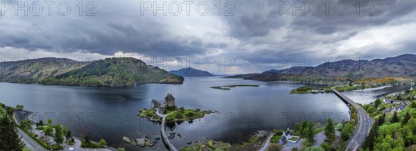 Panorama of Eilean Donan Castle and Loch Duich from a drone, Isle of Skye, Highlands, Scotland, England, United Kingdom, Europe