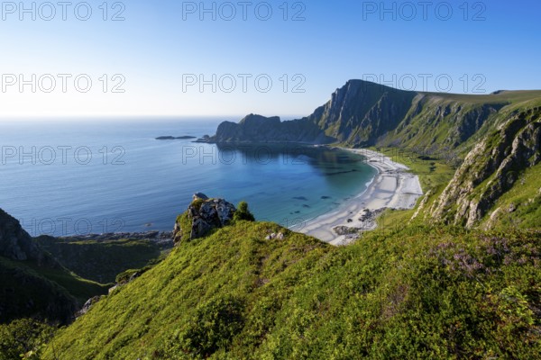 View of coastal landscape, cliffs with peak Måtind or Måtinden, Høyvika beach and sea, hike to the peak of Måtind, Andøya island, Vesterålen, Nordland, Norway, Europe