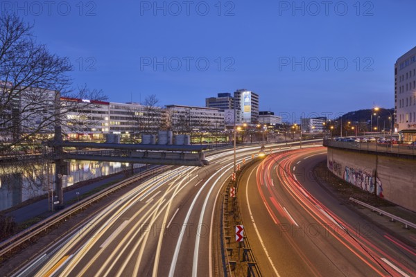 Motorway, modern architecture, river Saar, light traces, reflectors, headlights, blue hour, blue evening sky, cloudless, motorway 620, Saarbrücken, state capital, regional association Saarbrücken, Saarland, Germany, Europe