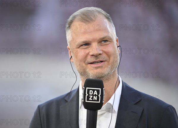 Chief Sports Officer Fabian Wohlgemuth VfB Stuttgart in an interview Microphone Micro Logo DAZN MHPArena, MHP Arena Stuttgart, Baden-Württemberg, Germany, Europe
