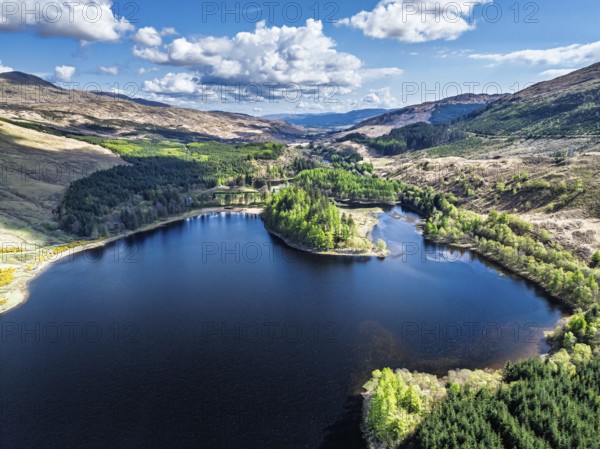 Mountains over Loch Iubhair from a drone, Crianlarich, Highlands, Scotland, United Kingdom, Europe