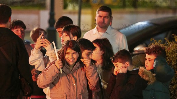 A group of children laughing and covering their ears, fireworks, Easter fire Psinthos, Holy Saturday, Easter, Psinthos, Rhodes, Dodecanese, Greek Islands, Greece, Europe
