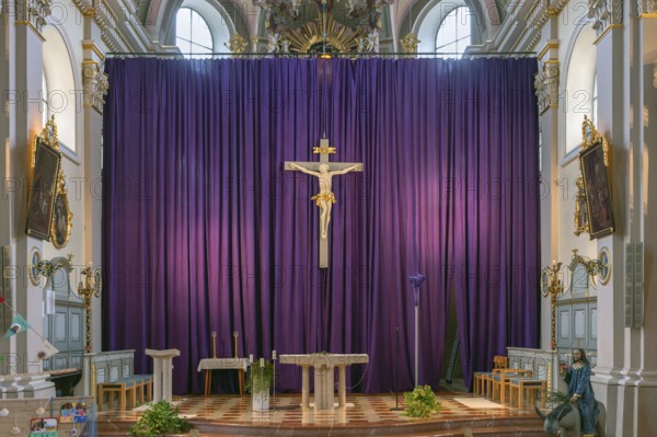 Large purple Lenten cloth in front of the high altar in the baroque parish church of St Nicholas, built between 1722 and 1724, Kirchacker 20, Tannheim, Austria, Europe