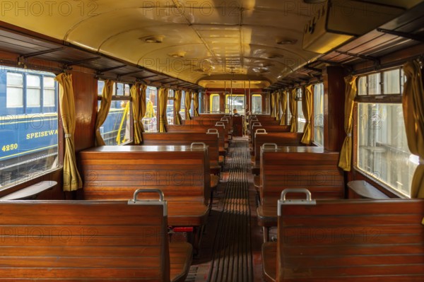 Passenger carriage with wooden benches at Stoomtrein Maldegem-Eeklo, heritage railway association at old NMBS station of Maldegem, Flanders, Belgium, Europe