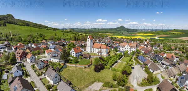 Aerial view, panorama, view of the municipality of Weiterdingen in Hegau with the church of St Mauritius, on the left the Hegau volcano Hohenstoffeln, on the right on the horizon the Hohenhewen, district of Constance, Baden-Württemberg, Germany, Europe