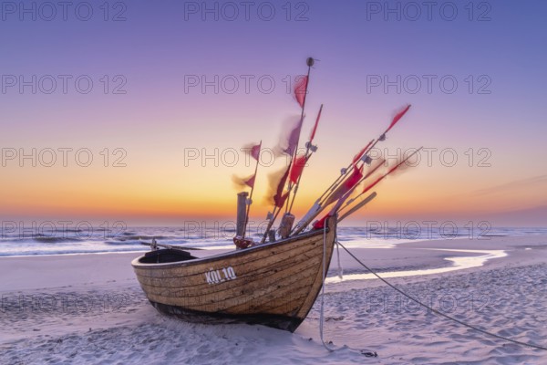 Traditional wooden fishing boat on the beach along the Baltic Sea at Stubbenfelde, Loddin on the island Usedom, Mecklenburg–Western Pomerania, Germany, Europe