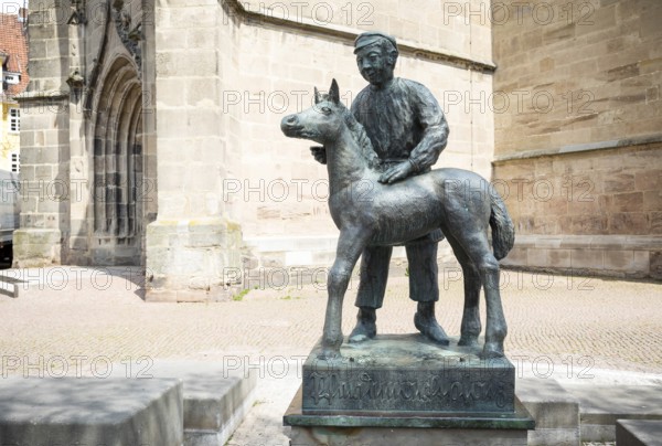 Figure on the horse fountain by Herbert Blaschke next to St Servatius Church, Duderstadt, Lower Saxony, Germany, Europe