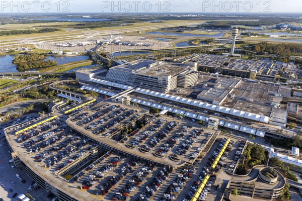Aerial view of Orlando International Airport with Terminal Concourse Airside 4 and Tower in Orlando, USA, North America