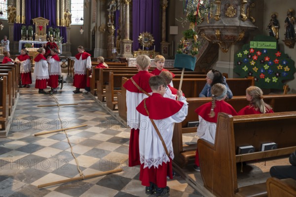 Preparation of the Palmesel procession, tradition since the 18th century, parish church Mariä Himmelfahrt, Thaur, district Innsbruck, Tyrol, Austria, Europe