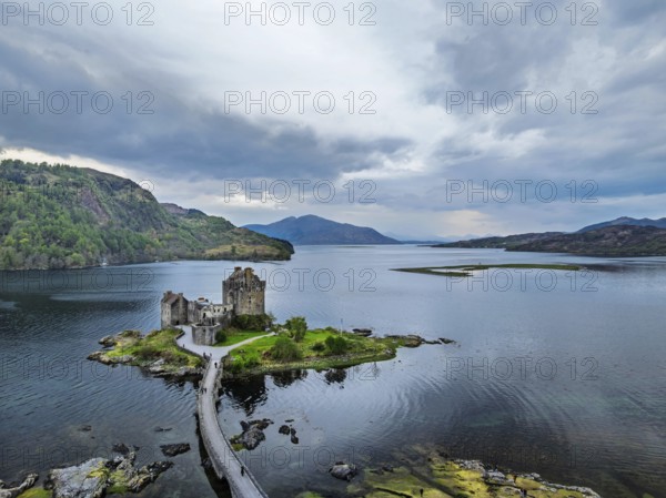 Eilean Donan Castle and Loch Duich from a drone, Isle of Skye, Highlands, Scotland, England, United Kingdom, Europe