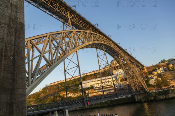 Golden hour at Dom Luis I Bridge crossing River Douro to Vila Nova de Gaia, Porto, Portugal, Europe 1886, Europe