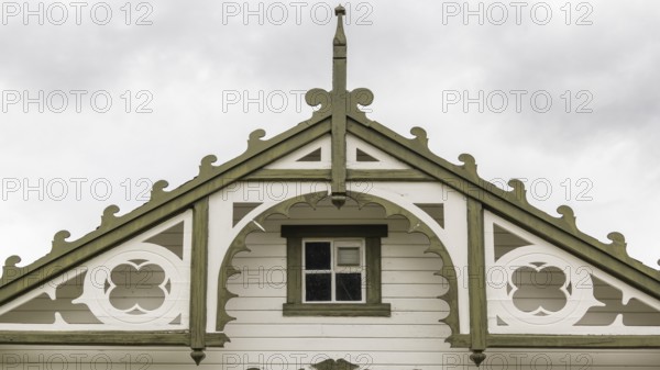Green and white wooden gable, Kongsvoll or Kongsvold Fjeldstue, historic mountain hut, Drivdalen valley, Dovrefjell, Oppdal municipality, Trøndelag county, Norway, Europe