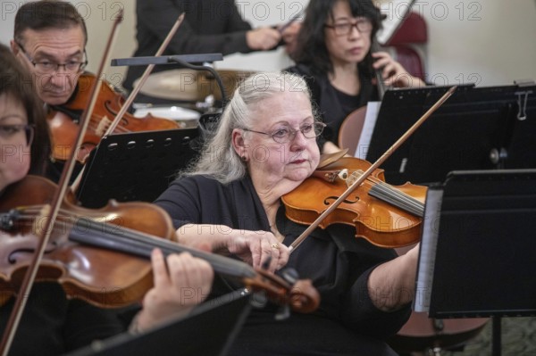 Livonia, Michigan - The Livonia Symphony Ensemble played a free concert at Laurel Park Place, a shopping mall in suburban Detroit. The concert celebrated the city of Livonia's 75th birthday