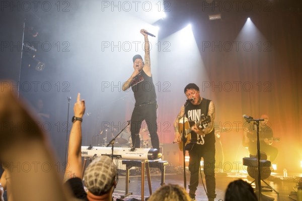 Ingo Knollmann (singer and keyboarder) and Guido Knollmann (singer and guitarist) of the Donots live on Schwert aus Holz Tour at Berlin's Heimathafen Neukölln on 02.05.2025