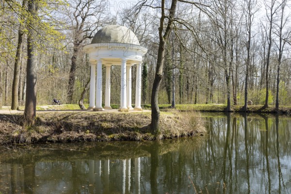 Diana Temple in Lützschena Castle Park with reflection in the water, Leipzig, Saxony, Germany, Europe