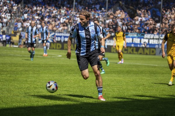 Football 3rd division, season 2024/25, matchday 37: Waldhof Mannheim vs Dynamo Dresden***Picture: Felix Lohkemper (9, Mannheim)