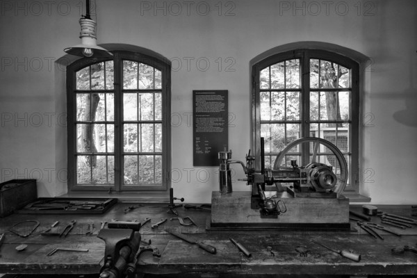 Interior photograph, first vehicle engine, the grandfather clock, Gottlieb Daimler's former workshop in the garden house, Gottlieb Daimler Memorial Site, Gottlieb Daimler Memorial Site, museum, spa gardens, black and white, Bad Cannstatt, Stuttgart, Baden-Württemberg, Germany, Europe