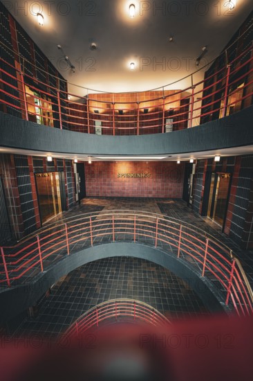 Modern multi-storey staircase with industrial flair and warm lighting, SPRINKENHOF, Hamburg, Germany, Europe