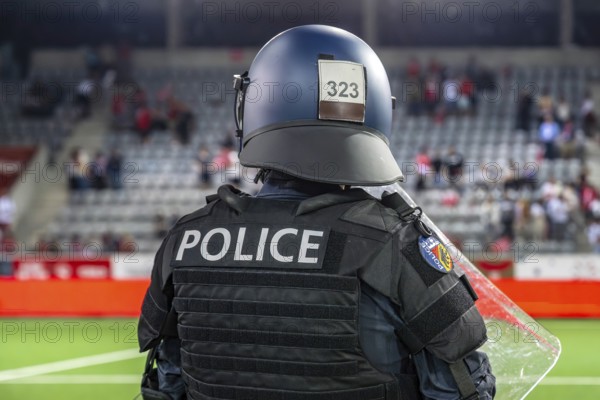 Police officer in combat gear Football stadium