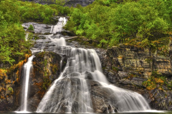 Waterfall in Long Exposure in the Forest in Valle Maggia, Ticino, Switzerland, Europe