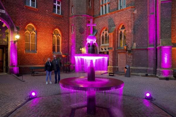 Kevelaer in the light, light installation inner courtyard of the confessional chapel with fountain in the evening, Kevelaer, Lower Rhine, North Rhine-Westphalia, Germany, Europe
