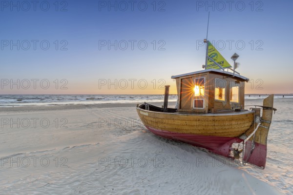 Traditional wooden fishing boat on the beach along the Baltic Sea at Ahlbeck, Heringsdorf on the island Usedom, Mecklenburg–Western Pomerania, Germany, Europe