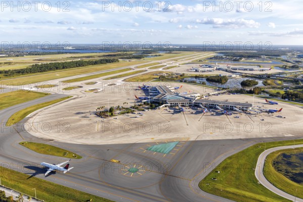 Aerial view of Orlando International Airport with terminal Southwest Airlines Concourse Airside 2 in Orlando, USA, North America