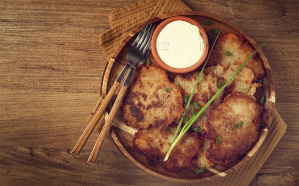 Potato pancakes, pancakes with sour cream, Belarusian dish, homemade, no people