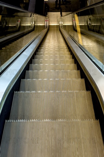 Escalator photographed from top to bottom, international
