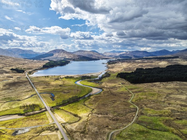 Mountains and Moors over Loch Tulla and River Orchy from a drone, Highlands, Scotland, UK