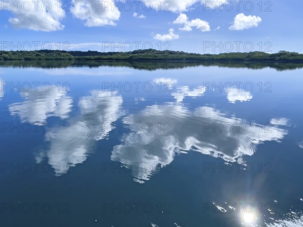 Reflection of white clouds cumulus in lagoon of Yap Island in Pacific Ocean, Caroline Islands, Yap Island, Yap State, Federated States of Micronesia FSM, Australia, Oceania