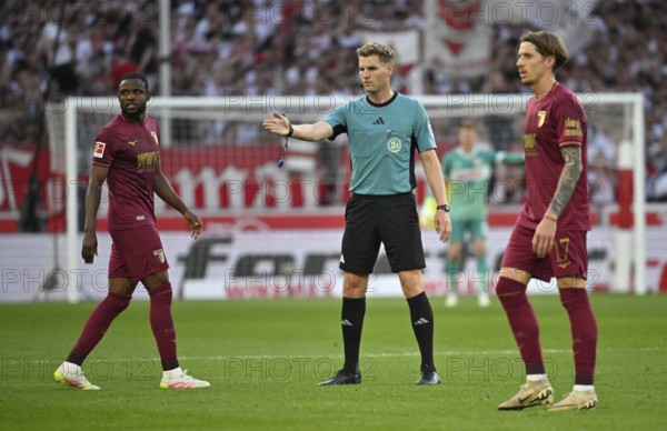 Referee Referee Timo Gerach Gesture Gesture Kristijan Jakic FC Augsburg FCA (17) Alexis Claude-Maurice FC Augsburg FCA (20) (left) MHPArena, MHP Arena Stuttgart, Baden-Württemberg, Germany, Europe