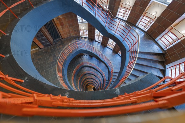 Spiral staircase with red banisters, vertical view downwards, SPRINKENHOF, Hamburg, Germany, Europe