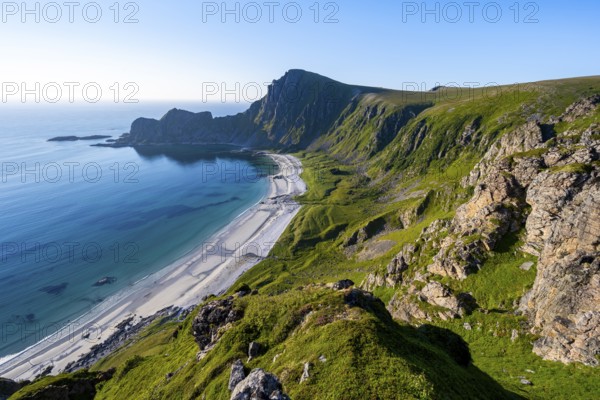 View of coastal landscape, cliffs with peak Måtind or Måtinden, Høyvika beach and sea, hike to the peak of Måtind, Andøya island, Vesterålen, Nordland, Norway, Europe