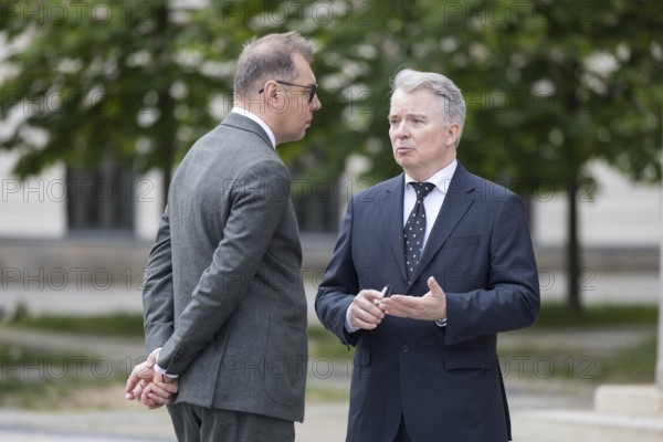 Oleksii Makeiev (Ambassador of Ukraine) and Konrad Arz von Straussenburg (German diplomat) talk after the silent commemoration of the 80th anniversary of the end of the Second World War in front of the Neue Wache, the central memorial of the Federal Republic of Germany for the victims of war and tyranny, Berlin, 8 May 2025