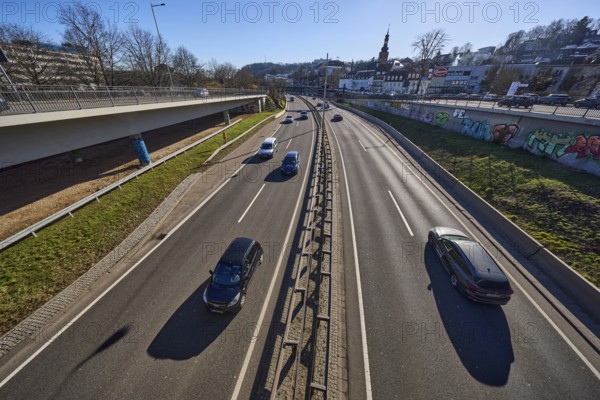 Motorway, vehicles, general development, church tower, lantern, trees, bird's eye view, backlight, blue sky, cloudless, motorway A620, Saarbrücken, state capital, regional association Saarbrücken, Saarland, Germany, Europe