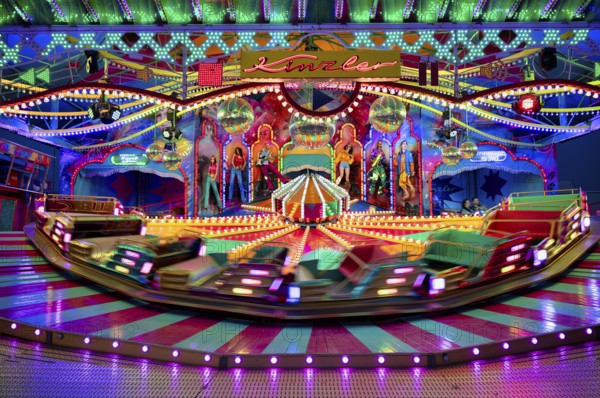 Petersburg sleigh ride, round ride, rides, motion, motion effect, neon lights, Cannstatter Wasen, funfair, spring festival, folk festival, Bad Cannstatt, Stuttgart, Baden-Württemberg, Germany, Europe