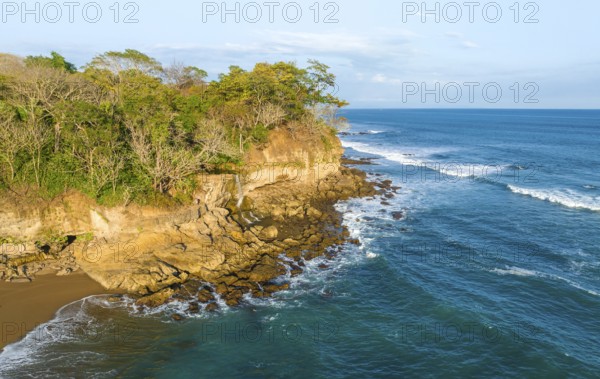 Aerial view, rainforest, sandy beach and coast with waves, Playa Cocalito, Puntarenas, Costa Rica, Central America